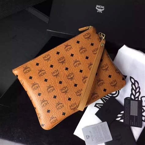 fake zip wristlet mcm
